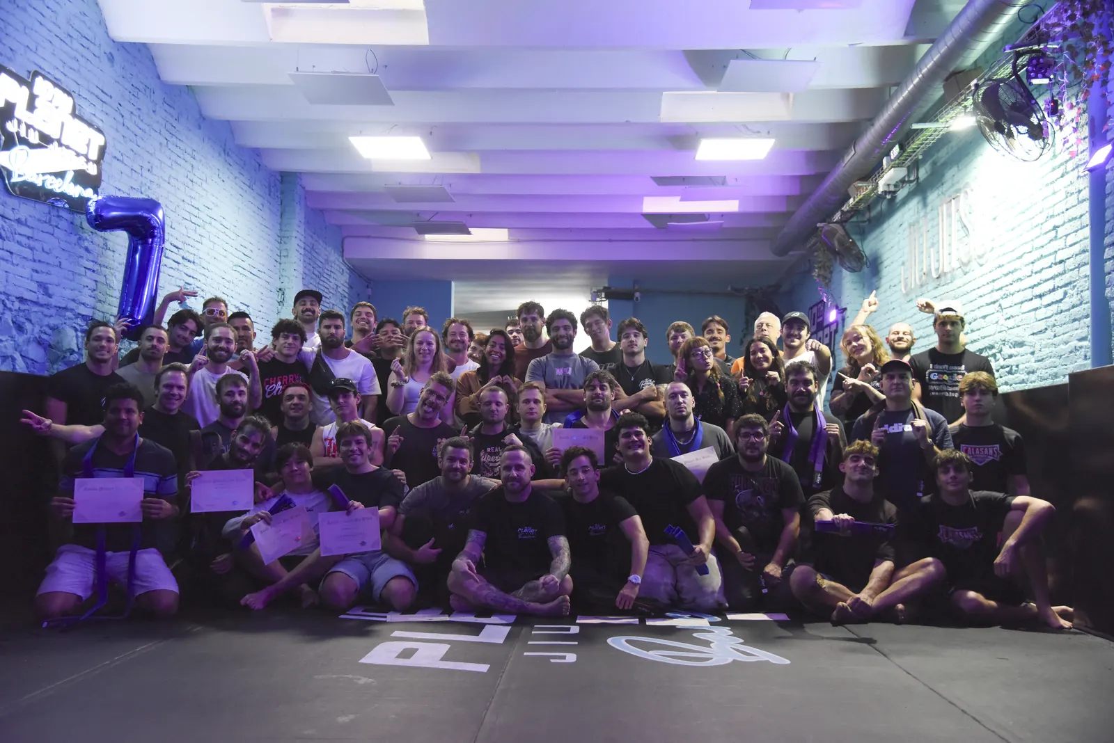Students and coaches of 10th Planet Jiu-Jitsu Barcelona at the club's seventh anniversary